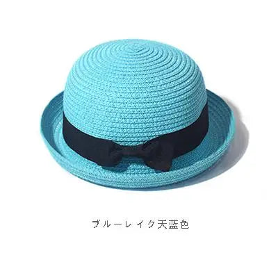 Ansoff women's summer straw sunhat with a round top, curled brim, ideal for sun protection, travel, and outdoor activities.