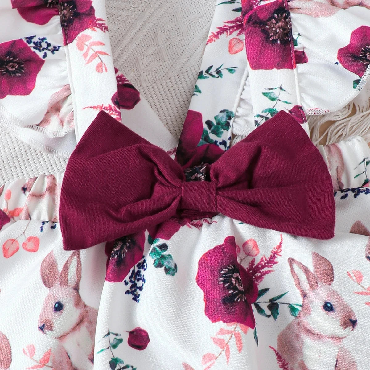 Baby girl summer outfit by Ansoff featuring a solid color jumpsuit, rabbit print skirt, and matching headband for ages 0-18 months.