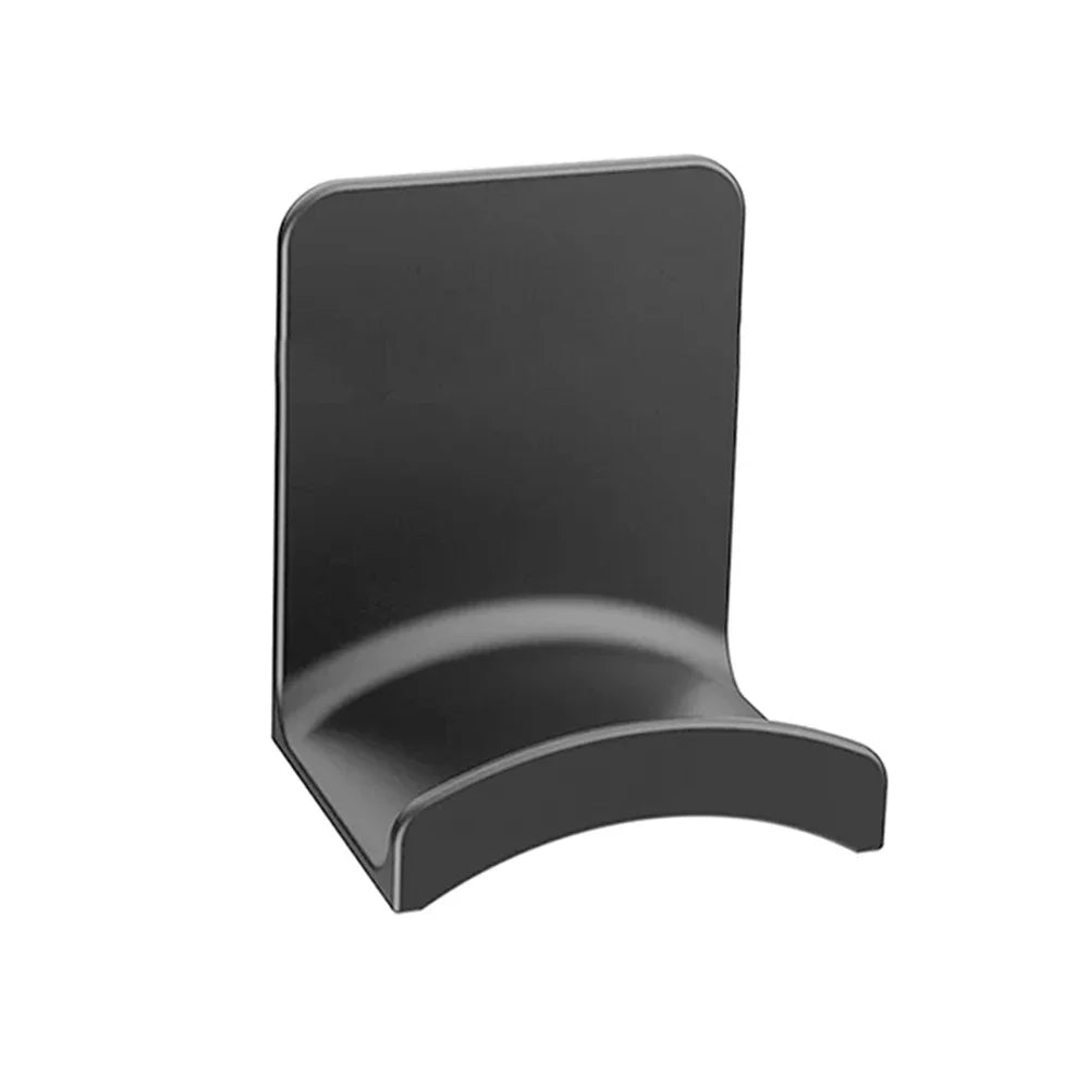 Ansoff universal headphone stand wall mount hanger supporting gaming earphones and headsets, made of adhesive plastic for under-desk use.