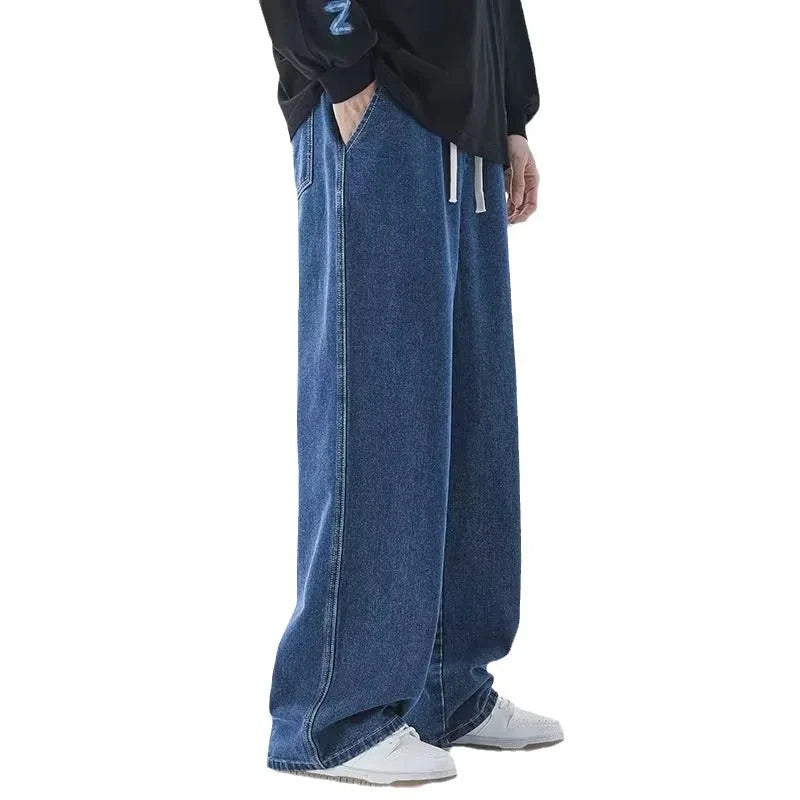 Men's large denim jeans from Ansoff, baggy streetwear trousers for teens and men, featuring classic blue denim style.