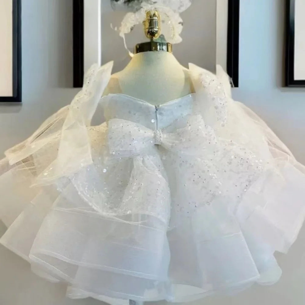 Girls sequined princess dress by Ansoff featuring a V-neck, bow shoulders, layered tulle skirt, perfect for formal parties.