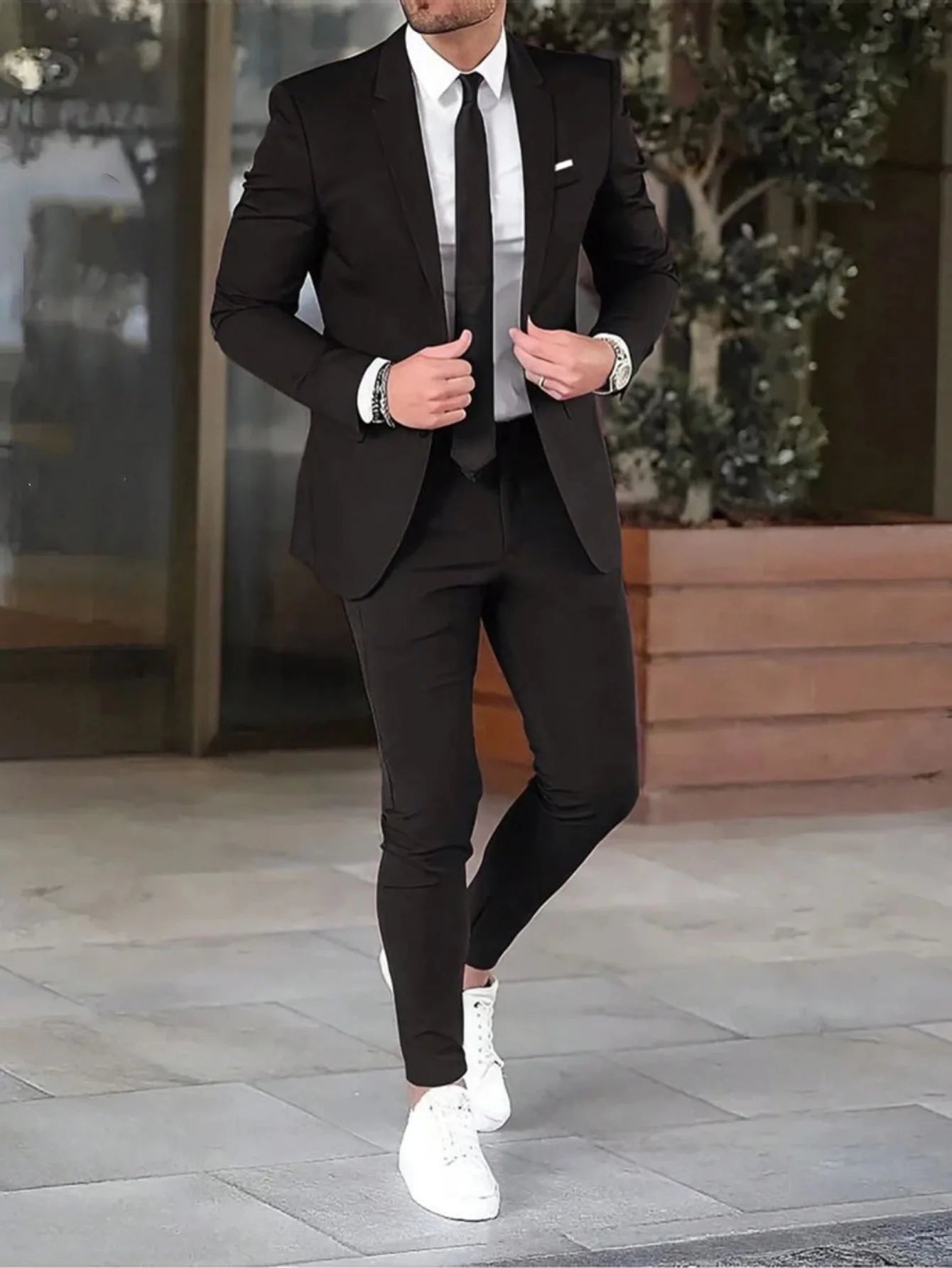Ansoff men's suit set featuring a slim-fit blazer and pants, ideal for fashion parties, weddings, or formal occasions.