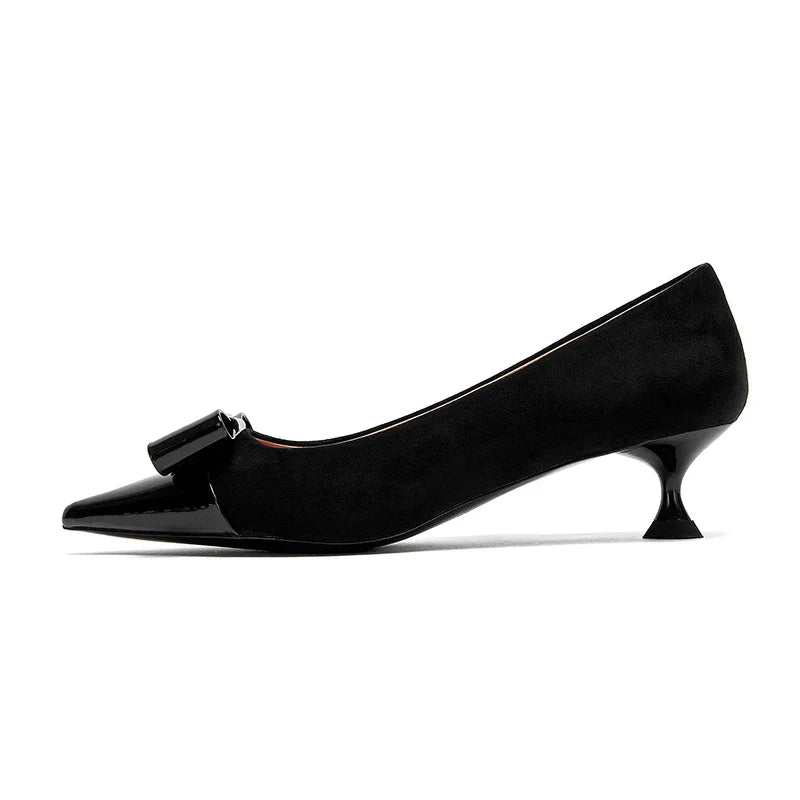 Women's low heeled shoes by Ansoff featuring pointed toes and British-style patchwork design, perfect for elegant commuting wear.