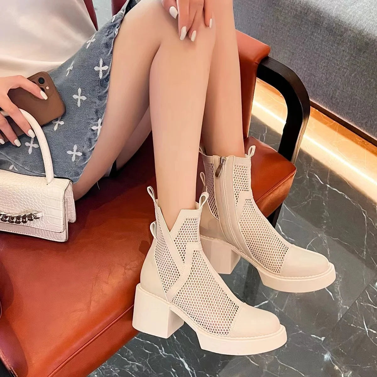 Ansoff women's solid color round toe thick heel boots with breathable mesh design, stylish and comfortable for everyday wear.