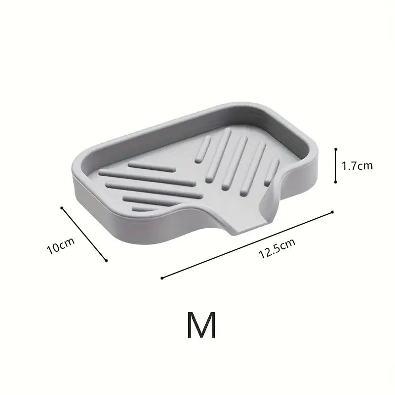 Ansoff silicone kitchen sink faucet mat with soap dispenser, sponge drain tray, and countertop drying pad for sink area.