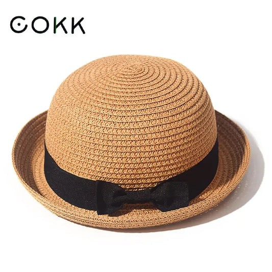 Ansoff women's summer straw sun hat with a round top and curled brim, ideal for travel, school, and outdoor sun protection
