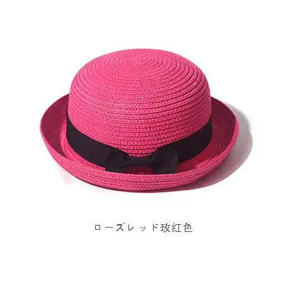 Ansoff women's summer straw sun hat with a round top and curled brim, perfect for sun protection and travel.