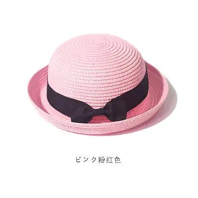Women’s summer straw sun hat by Ansoff with a round top, curled brim, ideal for sun protection, travel, and outdoor activities.