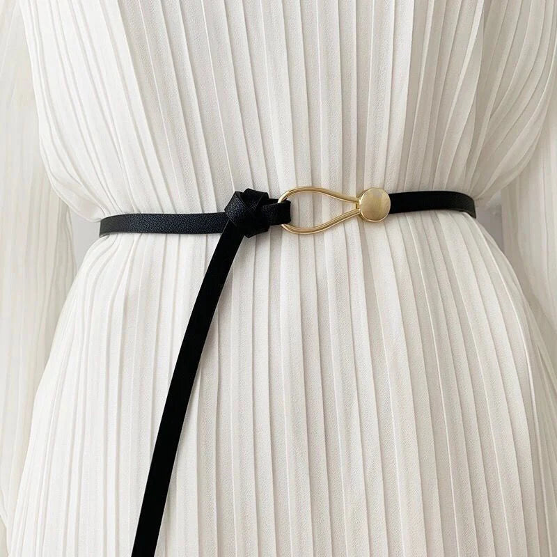 Ansoff thin leather belt for women, white and black, with a bow and knotted design, ideal as a casual dress or coat accessory.