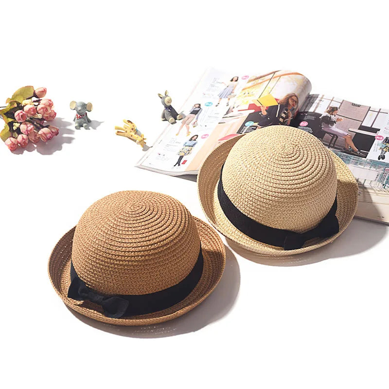 Ansoff women's summer straw hat with round top and curled brim, ideal for sun protection, travel, and outdoor activities.