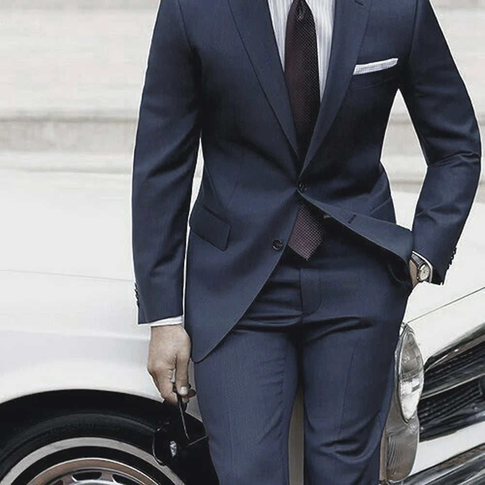 Ansoff tailor-made men's wedding suit in blue-gray, featuring a custom-fit suit with matching pants, perfect for formal occasions.