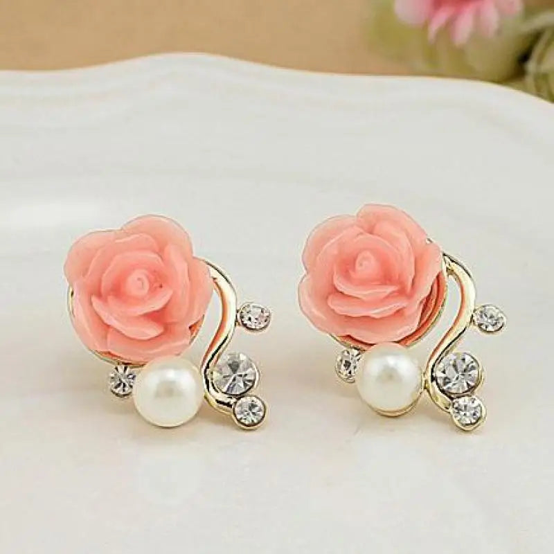 Gold and rose pearl stud earrings for women by Ansoff, featuring elegant pearl accents and a modern jewelry design.