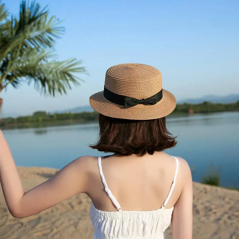 COKK Panama Simple Summer Beach Hat Female Casual Lady Women Flat Brim Bowknot Straw Cap Girls Sun Hat Chapeu Feminino