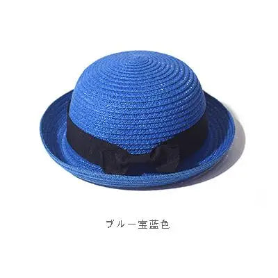 Ansoff women's summer straw sun hat with a round top and curled brim, ideal for sun protection, travel, and outdoor activities.