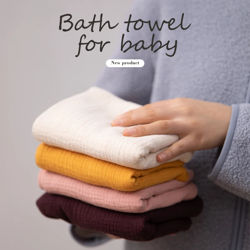 Soft baby towel and bathrobe from Ansoff, made of cotton, featuring a cute solid design for newborns and kids.