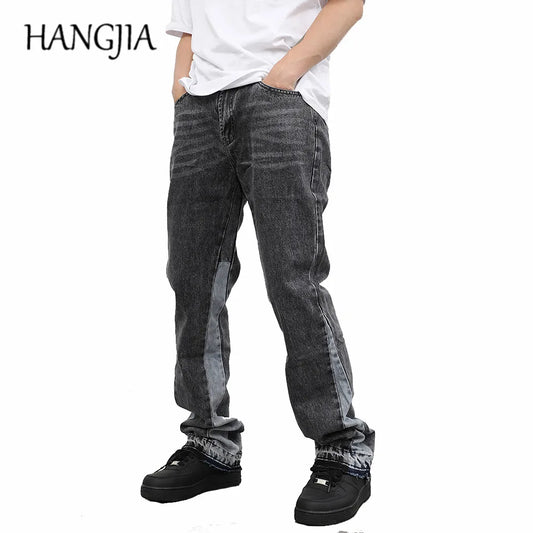 Men's vintage black flared jeans by Ansoff featuring frayed edges, graffiti-inspired colorblock design, slim fit denim for streetwear.