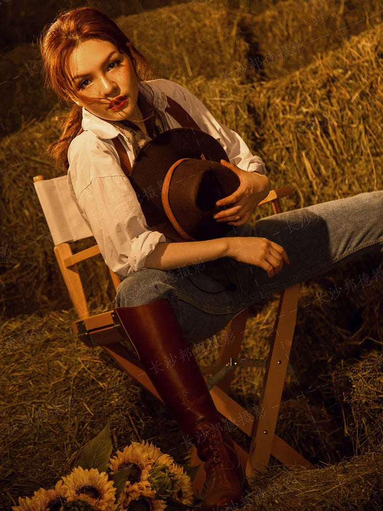 Vintage cowboy wide brim hat by Ansoff, featuring camel leather band, suitable for women, men, and kids, with a classic western style.