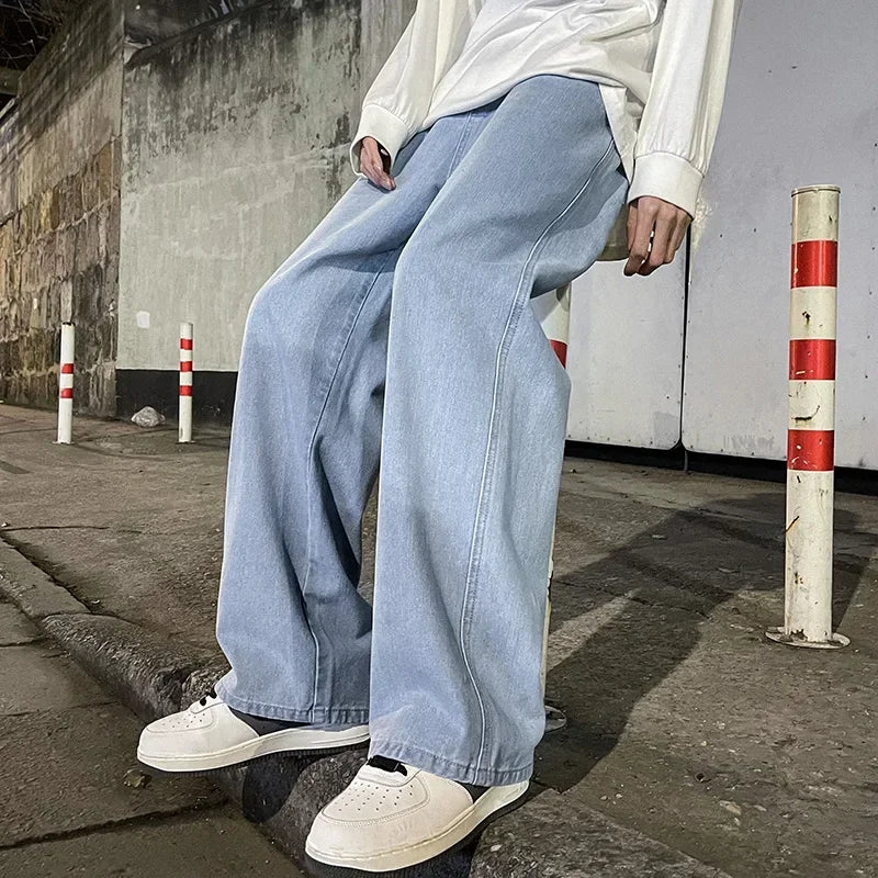 Ansoff men's streetwear loose jeans in black and light blue, featuring straight wide-leg design and Korean fashion style.