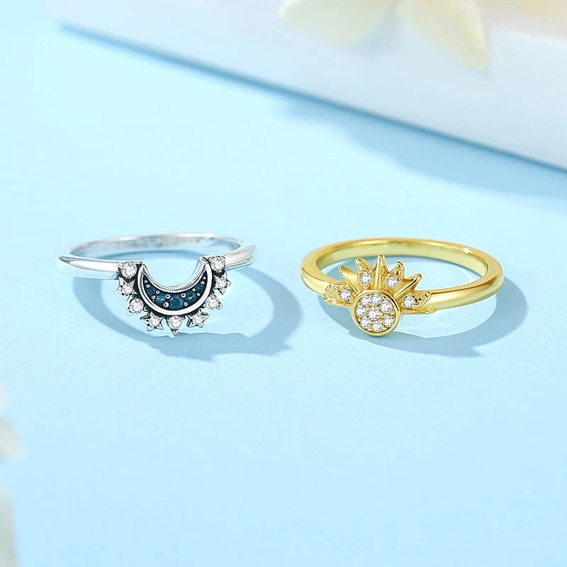 Sterling silver women's ring featuring a crown, love heart, and wishbone design with rose gold accents and crystal embellishments.