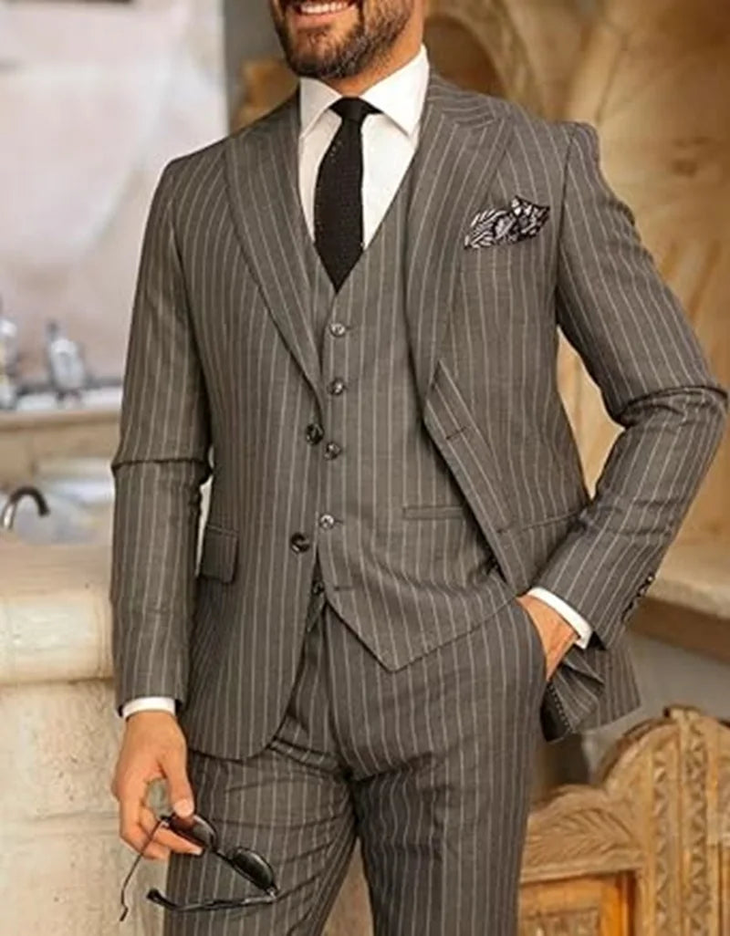 Men's elegant three-piece pinstripe suit including blazer, vest, and pants by Ansoff, suitable for weddings and business occasions.