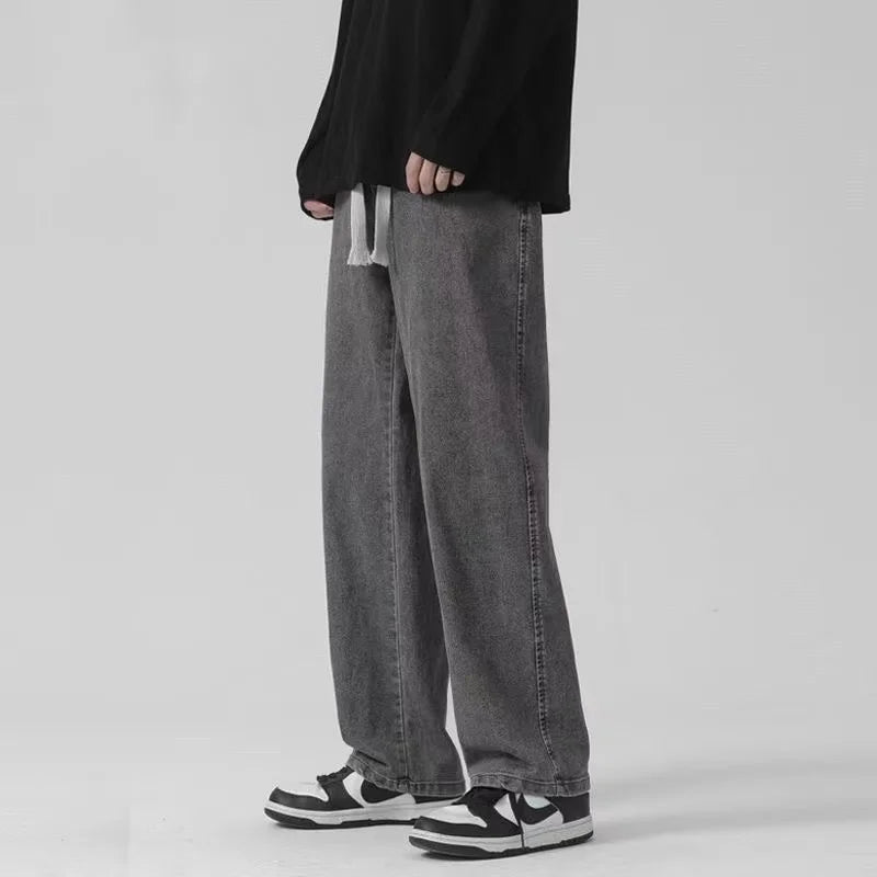 Men's loose streetwear jeans by Ansoff featuring Korean-style wide-leg, straight fit in black and light blue denim.