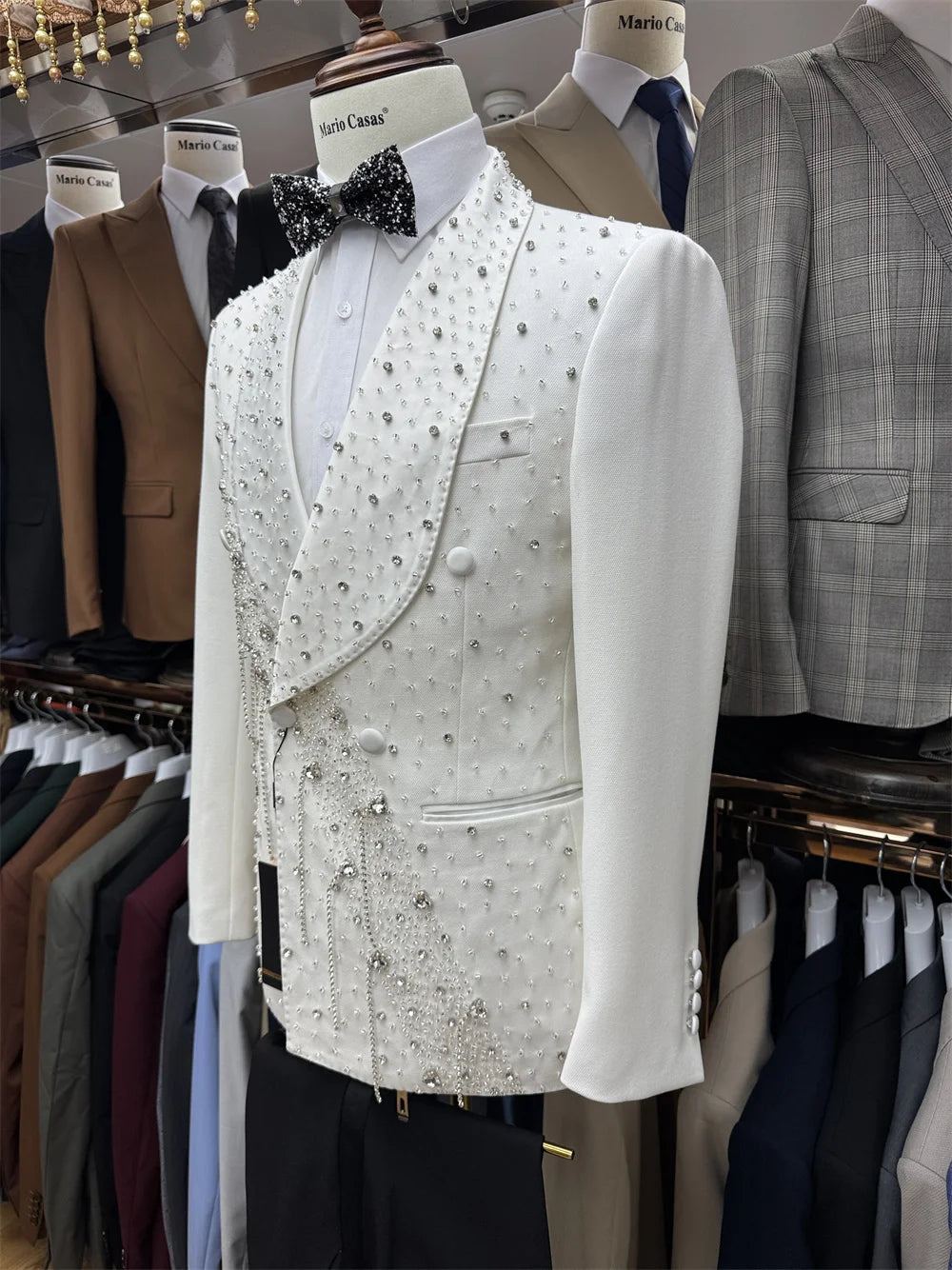 Elegant men's 2-piece wedding suit set by Ansoff featuring a tassel jacket, pants, and shawl lapel for formal occasions.