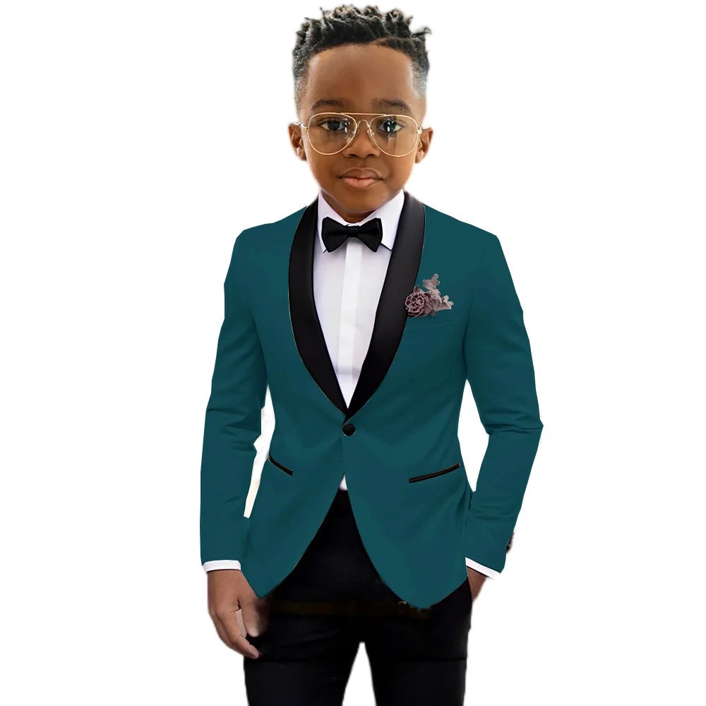 Children's slim fit tuxedo suit by Ansoff with shawl lapel, one-button jacket, and matching pants for wedding and formal occasions.