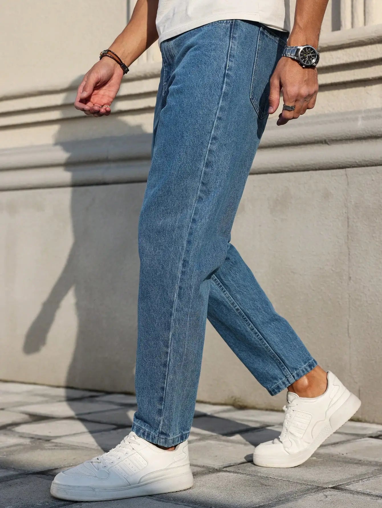 Men's blue denim jeans by Ansoff with a loose fit, showcasing classic denim fabric and versatile casual style.
