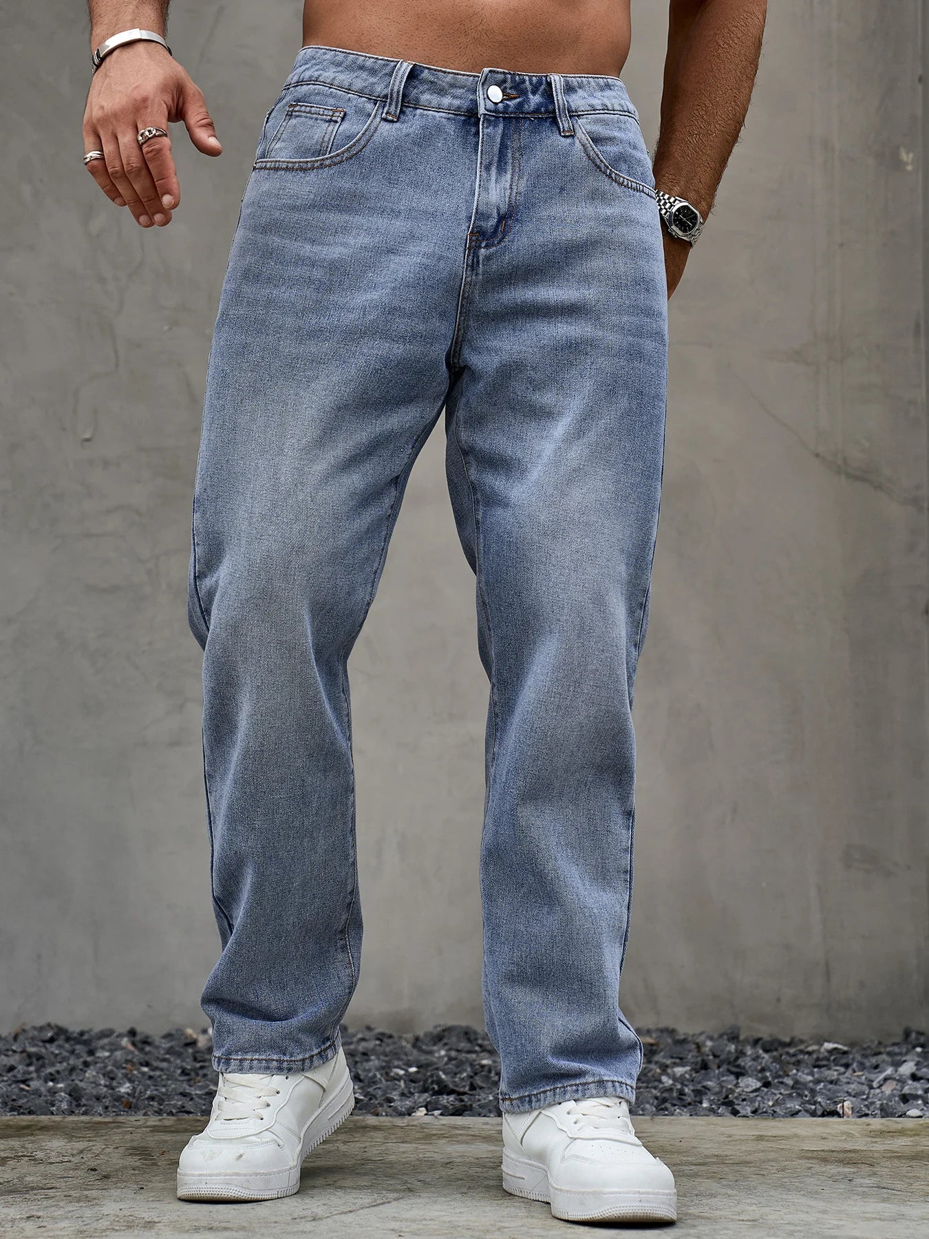 Men's blue denim jeans by Ansoff featuring a loose fit, straight leg style, soft durable fabric, ideal for casual all-season wear.