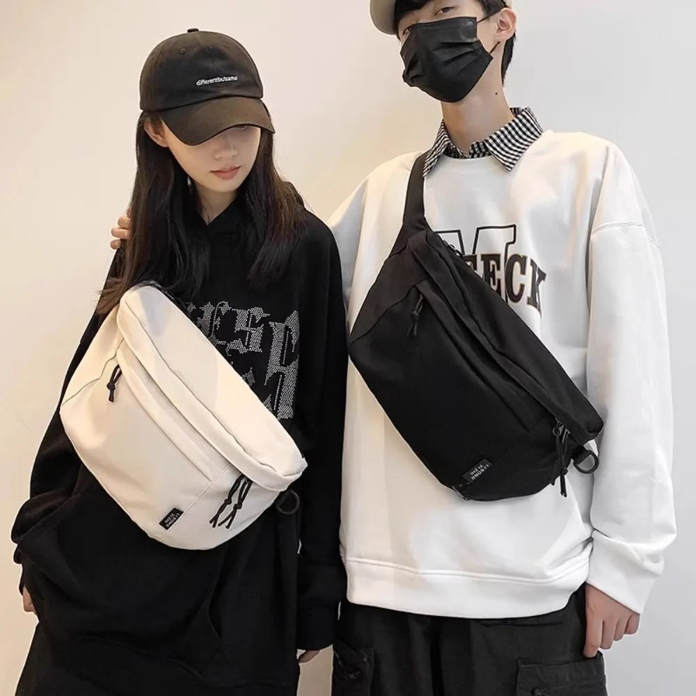Ansoff large capacity nylon crossbody bag with belt pouch, casual solid color travel hip bag for students and couples.