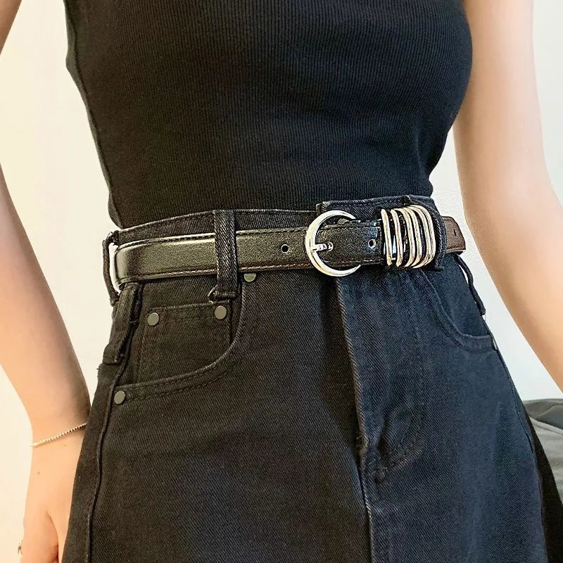 Black leather belt with needle metal buckle, two-layer cowhide design, suitable for women and men, casual and dress wear.