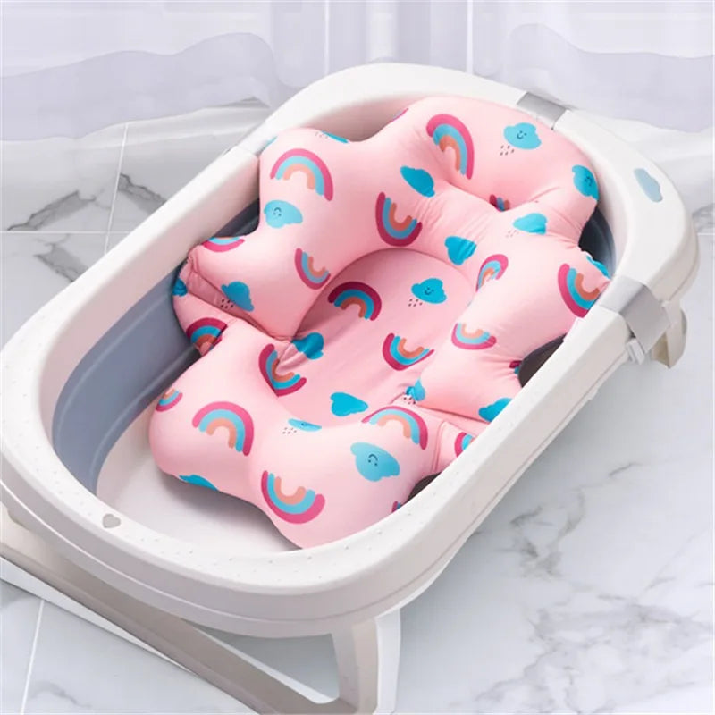 Ansoff baby shower bath tub pad with non-slip surface, animal-shaped soft cushion for newborn safety and comfort in the bathtub.