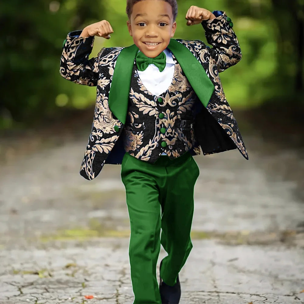 Boy wearing Ansoff slim fit jacquard 3-piece tuxedo suit with jacket, vest, and pants for wedding or celebration event.