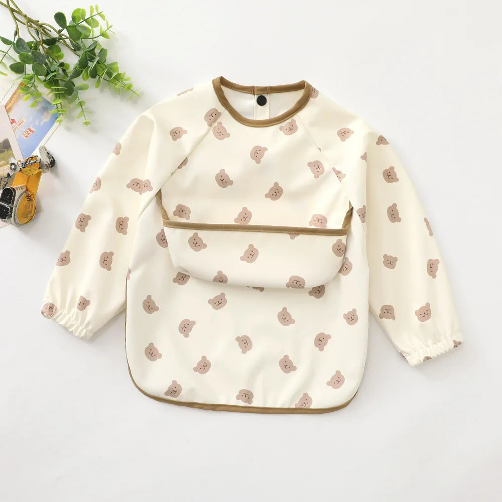 Ansoff infant feeding bibs for children with long sleeves, printed art design, waterproof, with a front pocket, ideal for messy eating.