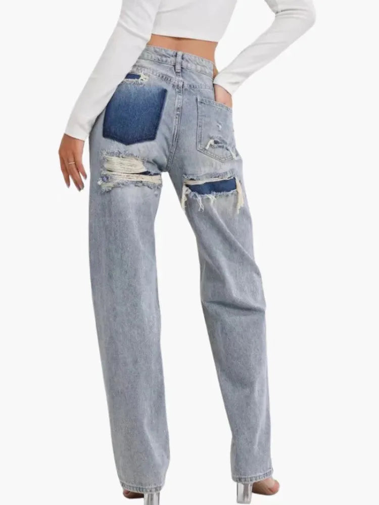 Women’s Ansoff denim jeans with high waist, wide leg, straight fit, stylish splice design, casual streetwear look.