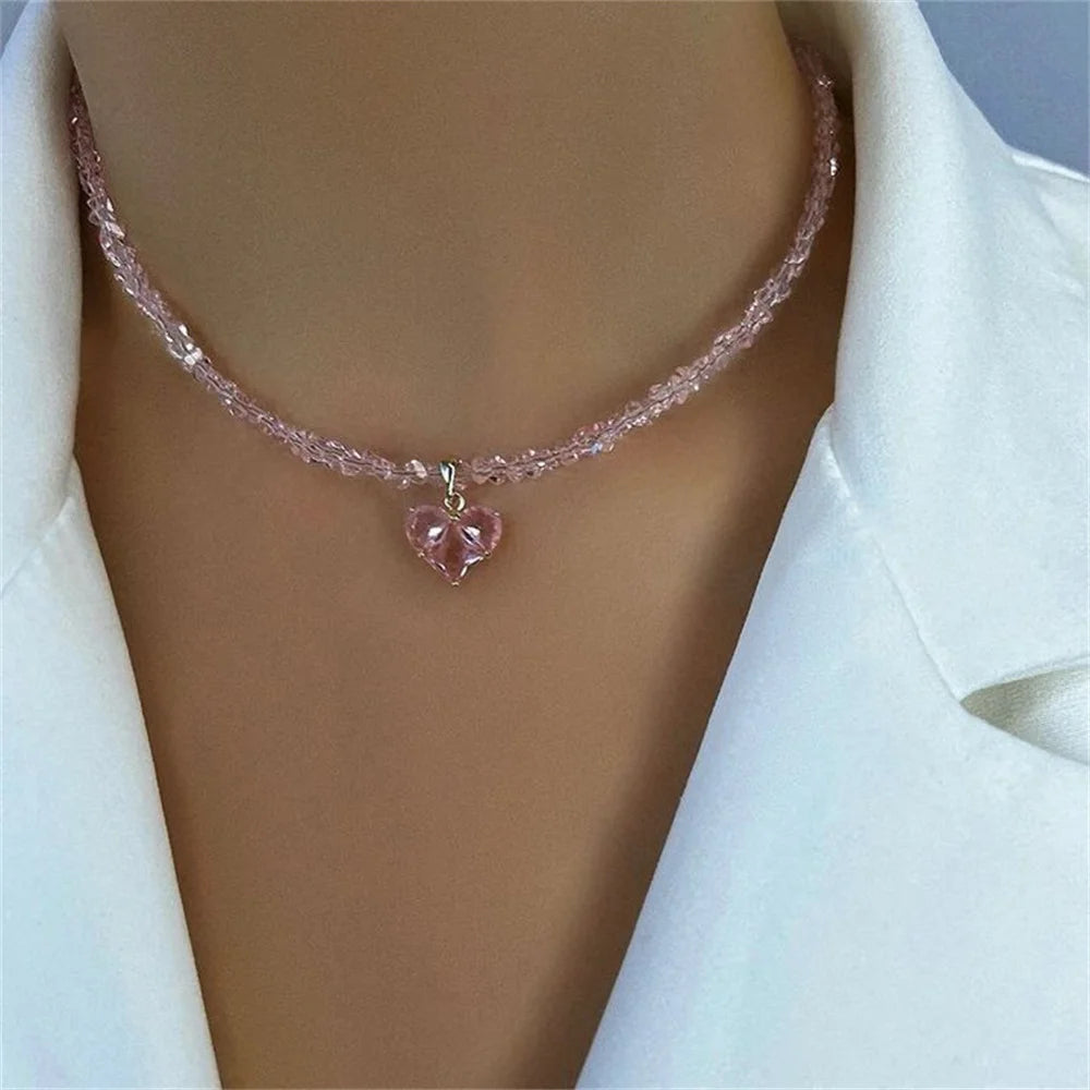 Ansoff vintage zircon heart pendant necklace for women featuring a boho geometric design with transparent crystals on a chain jewelry piece.