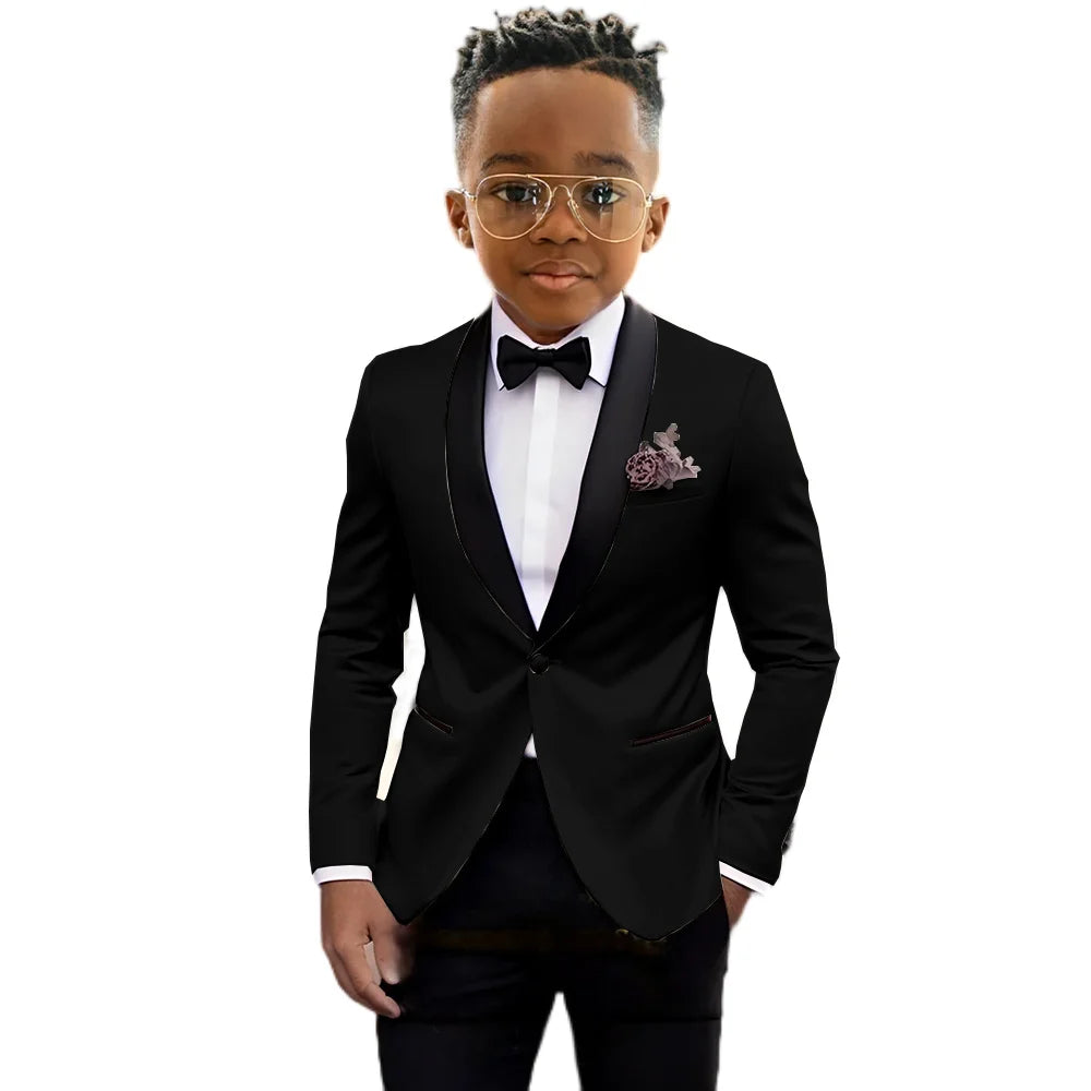 Children's slim fit tuxedo suit with shawl lapel, one-button jacket, and matching pants by Ansoff, ideal for weddings and formal events.