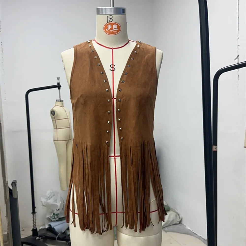 Women’s vintage faux suede fringe vest with rivets and tassels, open front boho leather western jacket by Ansoff.