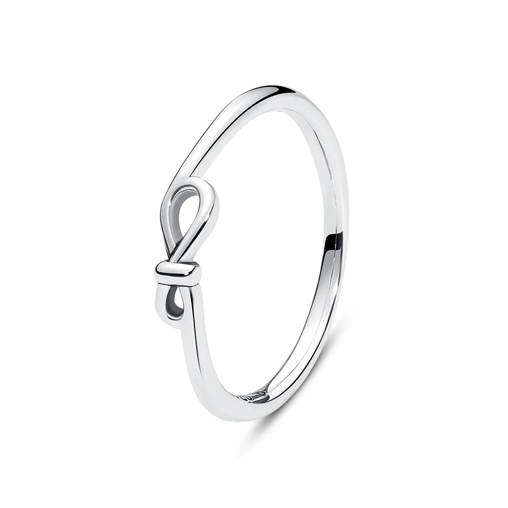 Sterling silver rings for women featuring crown, love heart, wishbone, and crystal details in rose gold, luxury jewelry by Ansoff.