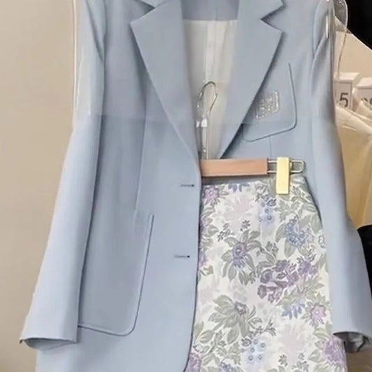 Ansoff blue floral skirt suit set with a vest, printed skirt, and matching coat for women, perfect for spring fashion.