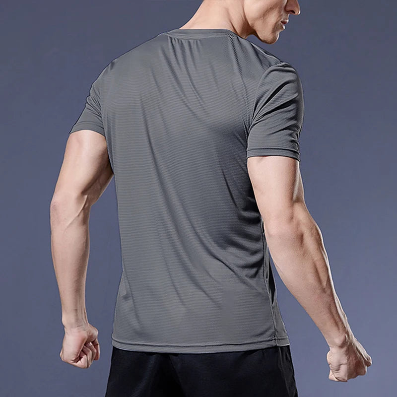 Men's Ansoff running shirt featuring quick-dry fabric, compression fit, and sporty design for jogging, gym, and fitness activities.