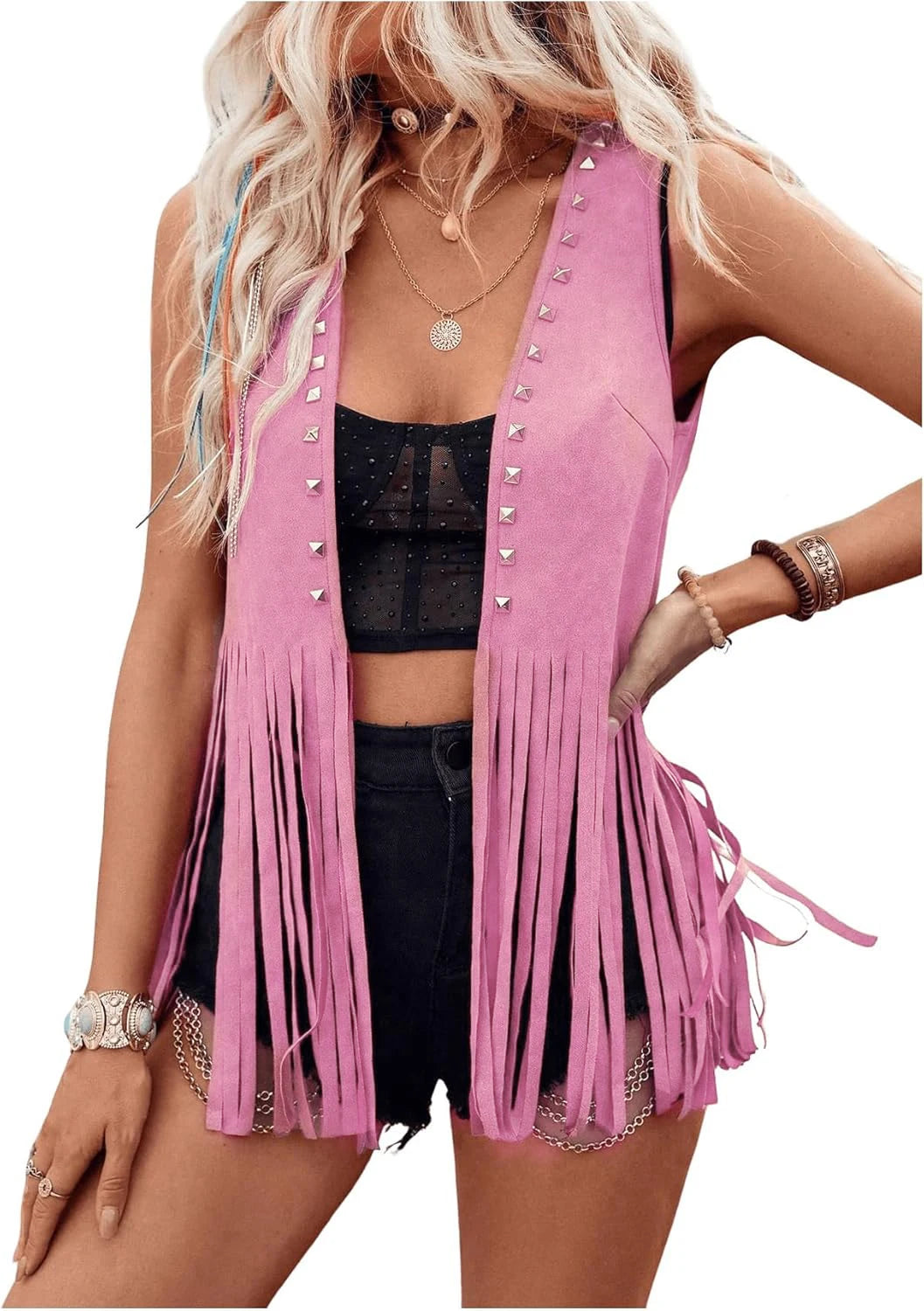Women’s vintage faux suede fringe vest by Ansoff, featuring rivets, tassels, open front design, and boho Western style.