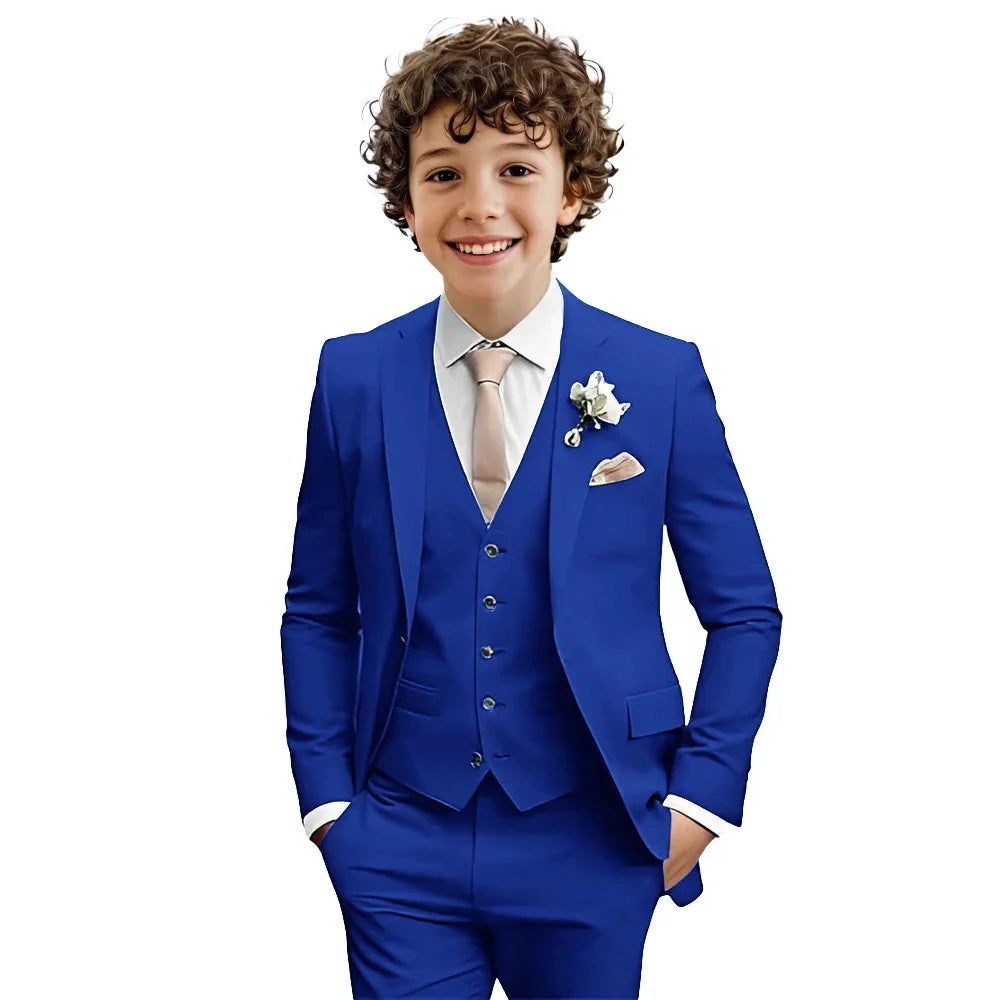 Multi-color boys' formal suit set by Ansoff featuring a tuxedo-style jacket, shirt, and pants, suitable for weddings and parties.