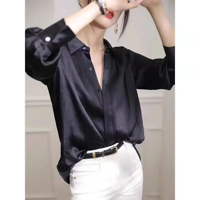 Women's black satin textured long-sleeved blouse by Ansoff, elegant loose-fit shirt for office and work wear.