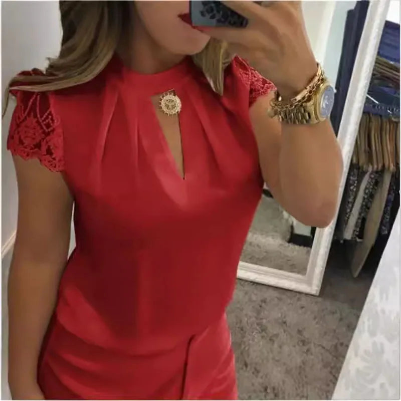 Women's high-neck blouse by Ansoff with deep V-back, lace sleeves, stand-up collar, patchwork design, and zipper detail.