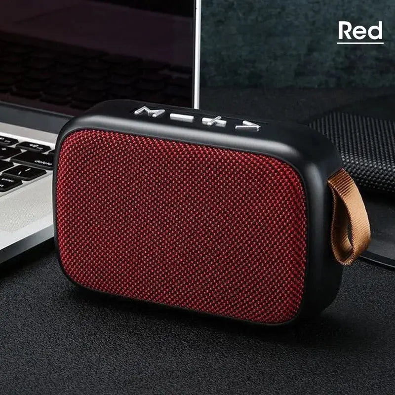 Ansoff wireless outdoor portable mini speaker with cloth covering and built-in subwoofer, ideal for home and outdoor audio use.