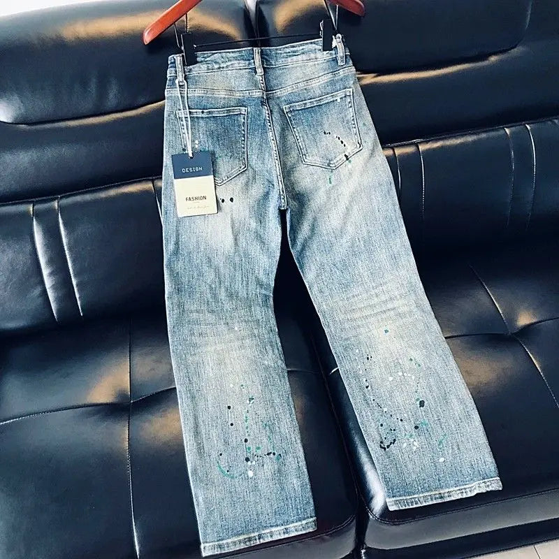 Men's blue jeans by Ansoff featuring cargo style, letter print, ink splashes, straight-leg fit, suitable for spring and summer wear.