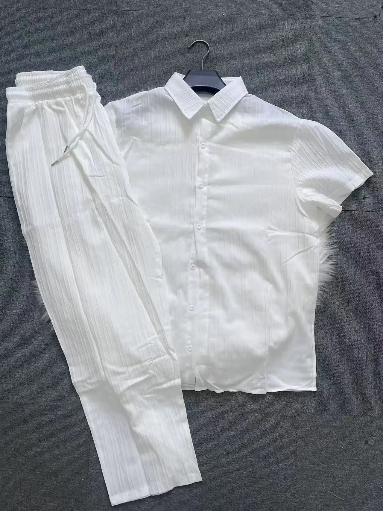 Men's summer suit by Ansoff, stylish men's clothing set featuring a lightweight suit for warm weather wear.
