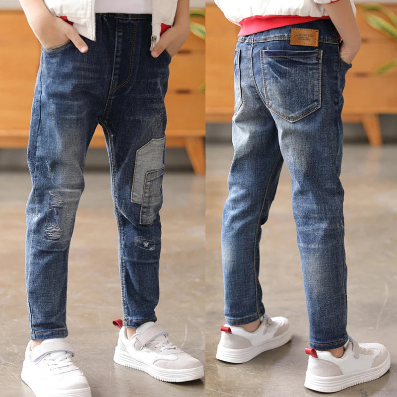 Kids' denim cowboy jeans by Ansoff, size 4-12, featuring durable denim, classic cowboy style, and comfortable fit for boys.