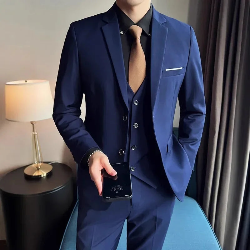 Men's stylish British-style business suit by Ansoff, featuring blazer, vest, and trousers in solid color for formal or casual occasions.